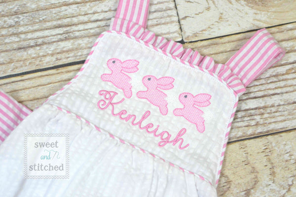 Monogrammed baby girl seersucker Easter romper with bunnies, girls cross backed bubble